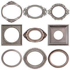 Set of oval silver frames for paintings, mirrors or photos isolated on white background