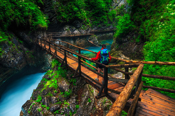 Sporty hiker woman enjoying the view in the Vintgar gorge