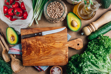 Fresh organic ingredients for healthy cooking or salad making on rustic background. Diet food...