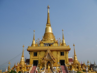 Naklejka premium Nakhon Sawan, Thailand-February 16, 2018: A view of Thai temple. People walk around the area.