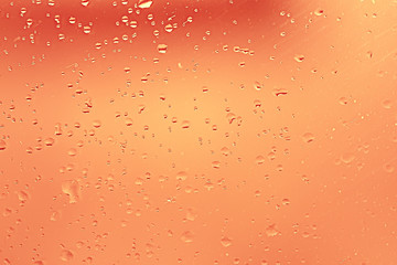 yellow tinted glass drops / abstract background texture