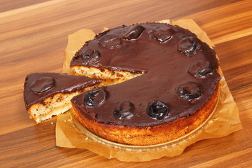 Chocolate Topped Sponge Cake with Prunes and Toffee Sauce