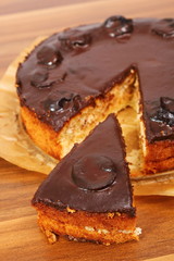 Chocolate Topped Sponge Cake with Prunes and Toffee Sauce