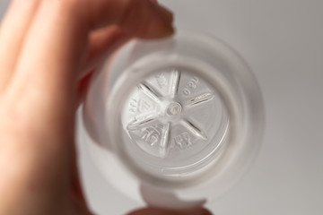 Marked bottom of a plastic transparent bottle