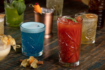 Many different multi-colored cocktails with different colors