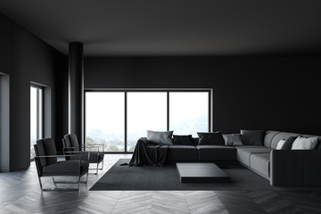 Grey living room with armchairs and sofas