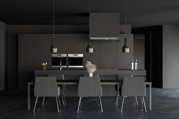 Gray kitchen with table and island, front view