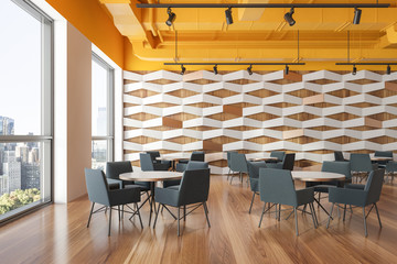 Yellow ceiling geometric pattern cafe interior