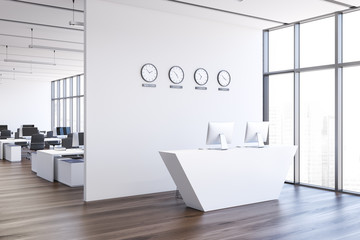 Reception desk in white open space office