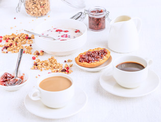 Selective focus on breakfast dishes on the table in rustic style. 