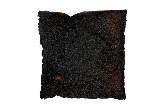 Burnt bread isolated on white background with clipping path, black toast by mistake, unsuccessful cooking and faild life, hard time or down and low self-esteem, depression and sadness concept