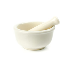 White Ceramic mortar and pestle isolated on white background