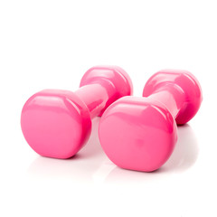 Pink dumbbells isolated on white background.Health and Fitness concept