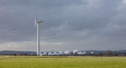 Wind turbine and the Golf Balls of RAF Menwith Hill near Harrogate, North Yorkshire