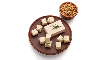 Healthy food concept. Tofu on plate, empty space