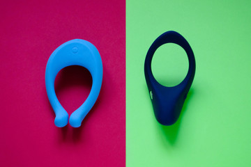 Sex toy. White Vibrator on a pink background