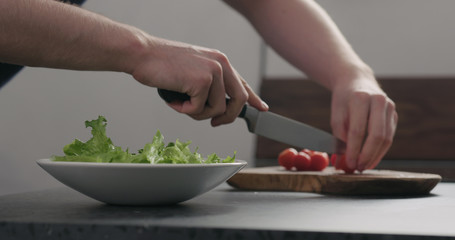tomatoes cut to make salad in white bowl