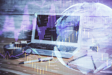 Multi exposure of chart and financial info and work space with computer background. Concept of...