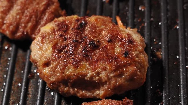 fried hamburger patties close-up. food preparation