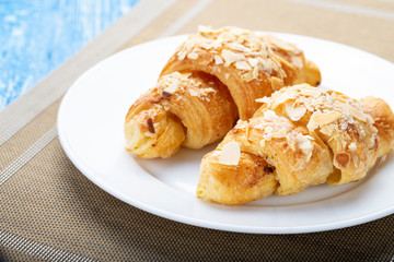 Two fresh croissants.