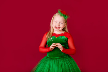 Kid dancer satisfied with concert outfit. Kids fashion. Kid fashionable green dress looks adorable. Clothes for ballroom dance. Ballroom dancewear fashion concept.