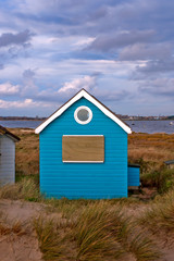 Fototapeta na wymiar Beach huts at Hengistbury Head near Bournemouth in Dorset, England