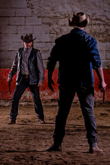 Two cowboys from the far west, dueling with guns - obrazy, fototapety, plakaty