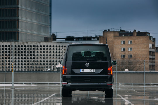 Multivan on parking of modern district