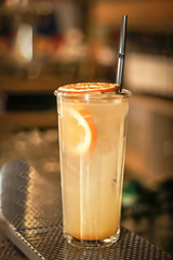 colored cocktails by the bar for people