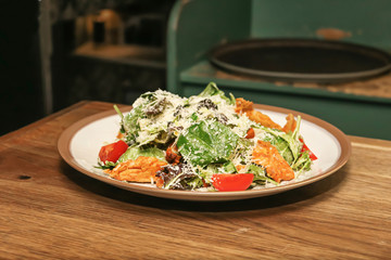 very tasty salad in a big plate on the table