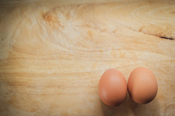hen egg put on wood cutting board in kitchen prepare cooking