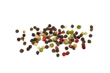 Black, red and white peppercorns, pepper mix isolated on white background.