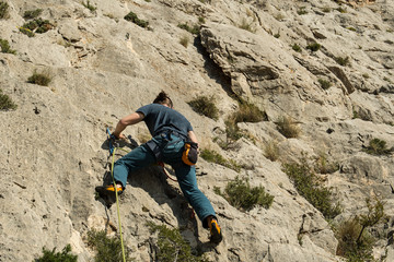 Rock climber in Spanish mountains.