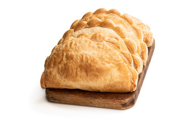 Homemade flaky pasty with mince meat filling isolated on white