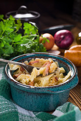 Pasta with sauerkraut and sausage.