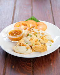 Sliced Chinese fish sausage with Thai spicy sauce