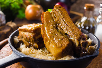 Traditional spare ribs baked in sauerkraut.