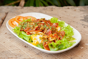 Spicy Chinese pork sausage with vegetable Thai salad