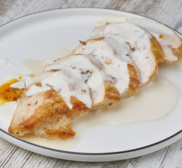 chicken breast sliced stuffed with sauce