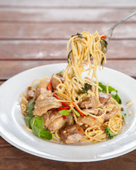 Spaghetti stir fried spicy thai pad ki mao chicken