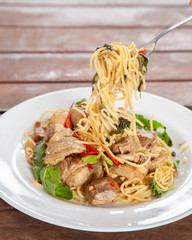 Spaghetti stir fried spicy thai pad ki mao chicken