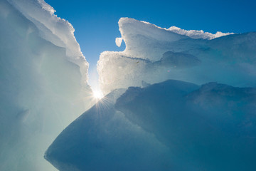 Ice berg formations and blue sky in Greenland