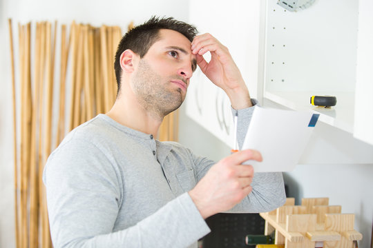 young male technician with issues