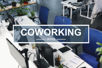 Coworking text over modern office, comfortable workplace interior