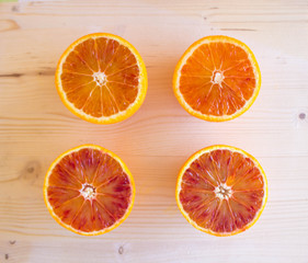 red Sicilian oranges full of vitamins on the wooden background, special Mediterranean diet