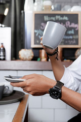 hand holding a cup. close up