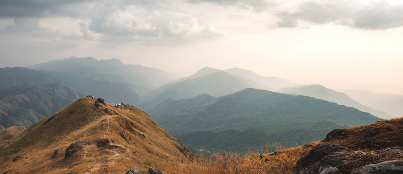 Panorama viewpoint and tent on the Mulayit Summit. The evening period, the grass is golden, which is moving according to the wind force. At Mulayit Taung in Myanmar is soft focus.