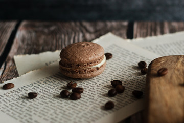 Macaroons. Delicious french dessert. Romantic composition with coffee and other elements.