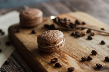 Macaroons. Delicious french dessert. Romantic composition with coffee and other elements.