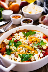 Shakshuka - fried eggs with vegetables